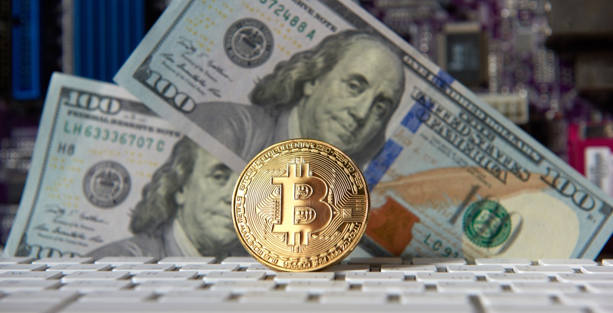 bitcoin-golden-coin-and-dollar-background-2023-11-27-05-21-10-utc-1